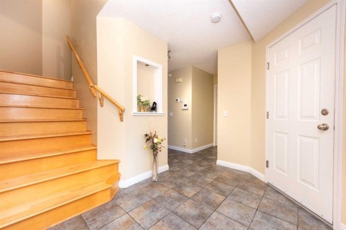 49 Rocky Ridge Heath Nw, Calgary, AB - Indoor Photo Showing Other Room