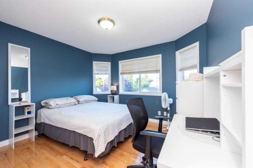 49 Rocky Ridge Heath Nw, Calgary, AB - Indoor Photo Showing Bedroom