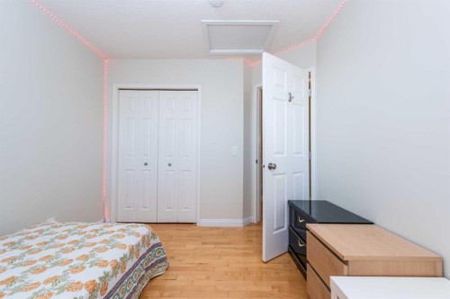 49 Rocky Ridge Heath Nw, Calgary, AB - Indoor Photo Showing Bedroom