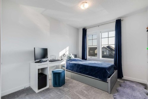 629 Reynolds Crescent Sw, Airdrie, AB - Indoor Photo Showing Bedroom