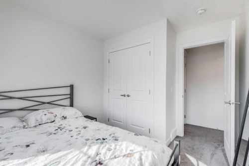 629 Reynolds Crescent Sw, Airdrie, AB - Indoor Photo Showing Bedroom