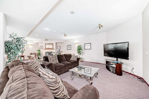 112-2850 51 Street Sw, Calgary, AB - Indoor Photo Showing Living Room