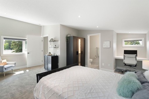100 Cambrian Drive Nw, Calgary, AB - Indoor Photo Showing Bedroom