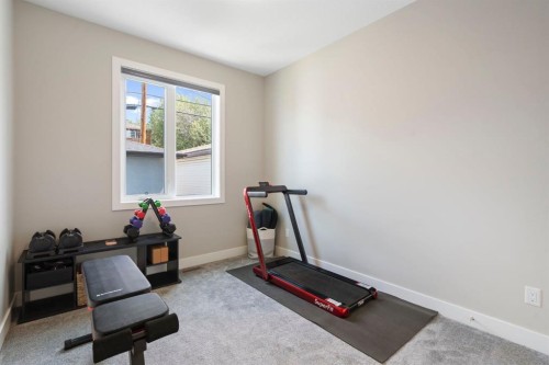 100 Cambrian Drive Nw, Calgary, AB - Indoor Photo Showing Gym Room