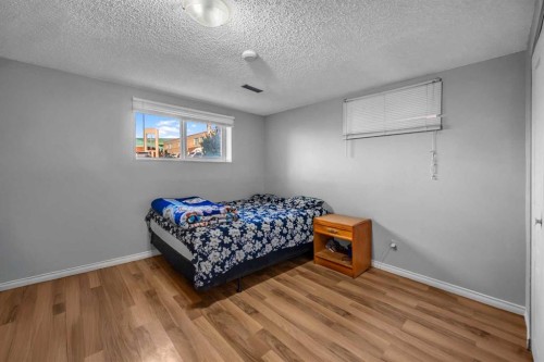 1019 Falworth Road Ne, Calgary, AB - Indoor Photo Showing Bedroom