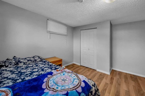 1019 Falworth Road Ne, Calgary, AB - Indoor Photo Showing Bedroom