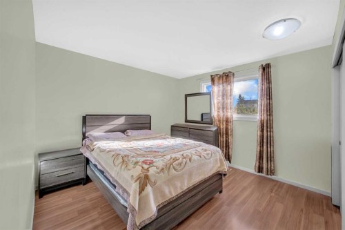 1019 Falworth Road Ne, Calgary, AB - Indoor Photo Showing Bedroom
