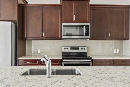 286 Redstone Drive Ne, Calgary, AB - Indoor Photo Showing Kitchen With Double Sink With Upgraded Kitchen