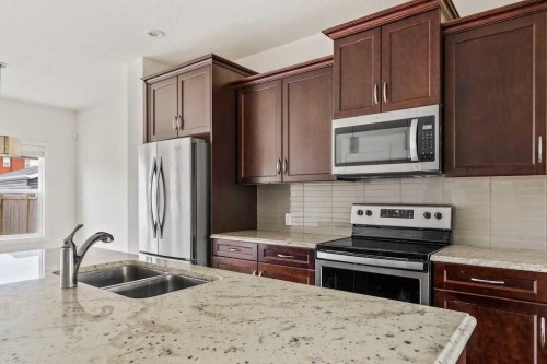 286 Redstone Drive Ne, Calgary, AB - Indoor Photo Showing Kitchen With Double Sink With Upgraded Kitchen