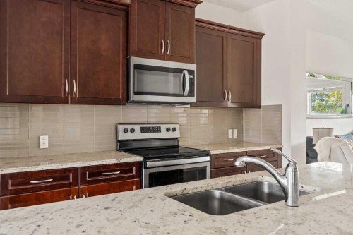 286 Redstone Drive Ne, Calgary, AB - Indoor Photo Showing Kitchen With Double Sink With Upgraded Kitchen