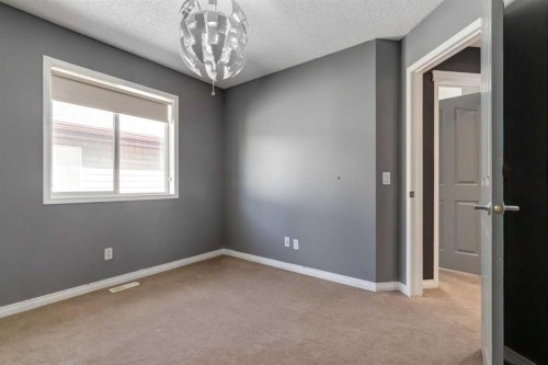 10 Chapala Road Se, Calgary, AB - Indoor Photo Showing Other Room