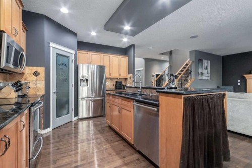 10 Chapala Road Se, Calgary, AB - Indoor Photo Showing Kitchen With Stainless Steel Kitchen