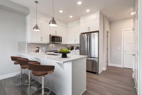 1114-110 Greenbriar Place Nw, Calgary, AB - Indoor Photo Showing Kitchen With Stainless Steel Kitchen With Upgraded Kitchen