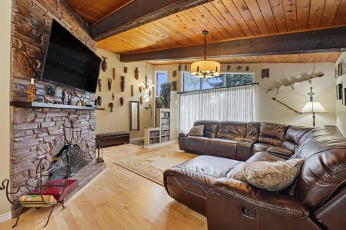 1804 Braemar Place Sw, Calgary, AB - Indoor Photo Showing Living Room With Fireplace