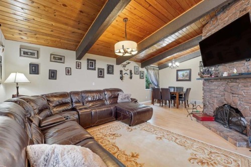 1804 Braemar Place Sw, Calgary, AB - Indoor Photo Showing Living Room With Fireplace