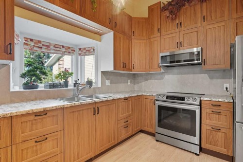 1804 Braemar Place Sw, Calgary, AB - Indoor Photo Showing Kitchen With Double Sink