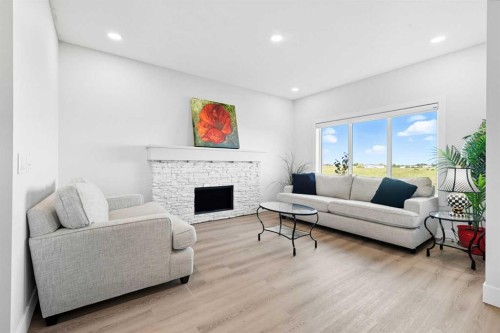 78 Copperpond Street Se, Calgary, AB - Indoor Photo Showing Living Room With Fireplace