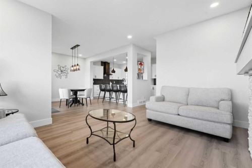 78 Copperpond Street Se, Calgary, AB - Indoor Photo Showing Living Room