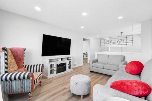 78 Copperpond Street Se, Calgary, AB - Indoor Photo Showing Living Room