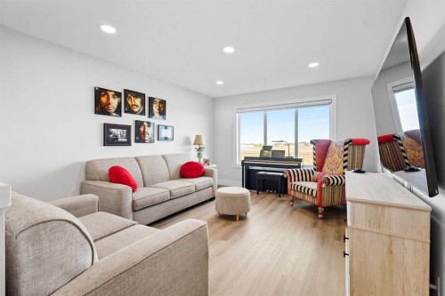 78 Copperpond Street Se, Calgary, AB - Indoor Photo Showing Living Room