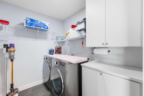 78 Copperpond Street Se, Calgary, AB - Indoor Photo Showing Laundry Room