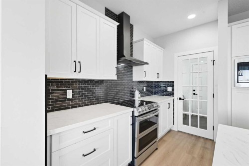 78 Copperpond Street Se, Calgary, AB - Indoor Photo Showing Kitchen With Upgraded Kitchen