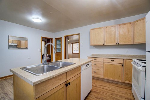 4705 3 Street West, Claresholm, AB - Indoor Photo Showing Kitchen With Double Sink