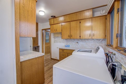 4705 3 Street West, Claresholm, AB - Indoor Photo Showing Laundry Room