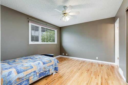 16 Ridgegate Way Sw, Airdrie, AB - Indoor Photo Showing Bedroom