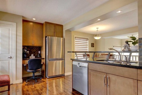 315 Aspen Hills Villas Sw, Calgary, AB - Indoor Photo Showing Kitchen With Double Sink