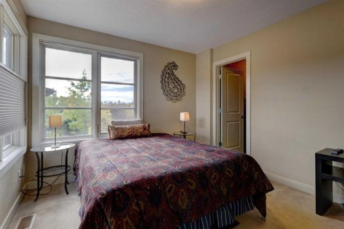 315 Aspen Hills Villas Sw, Calgary, AB - Indoor Photo Showing Bedroom