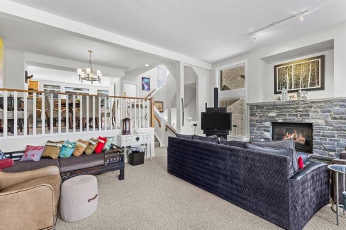 153-13 Aspen Glen, Canmore, AB - Indoor With Fireplace