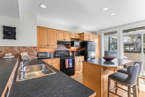 153-13 Aspen Glen, Canmore, AB - Indoor Photo Showing Kitchen