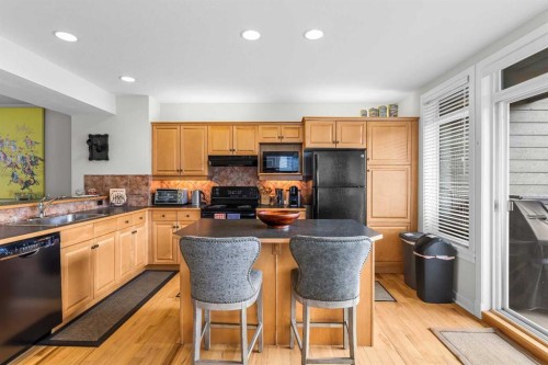 153-13 Aspen Glen, Canmore, AB - Indoor Photo Showing Kitchen With Double Sink