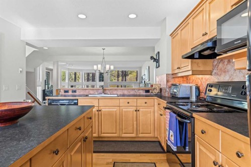153-13 Aspen Glen, Canmore, AB - Indoor Photo Showing Kitchen
