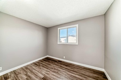327 Falshire Way Ne, Calgary, AB - Indoor Photo Showing Other Room