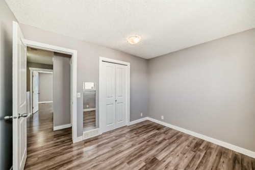 327 Falshire Way Ne, Calgary, AB - Indoor Photo Showing Other Room