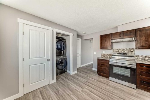 327 Falshire Way Ne, Calgary, AB - Indoor Photo Showing Kitchen