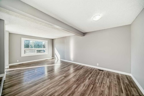327 Falshire Way Ne, Calgary, AB - Indoor Photo Showing Other Room