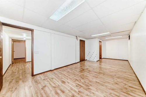 656 Woodbine Boulevard Sw, Calgary, AB - Indoor Photo Showing Other Room