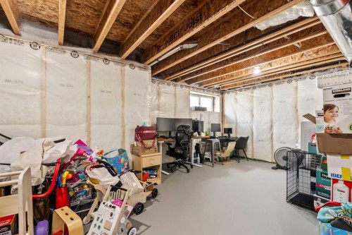 313 Evansglen Drive Nw, Calgary, AB - Indoor Photo Showing Basement