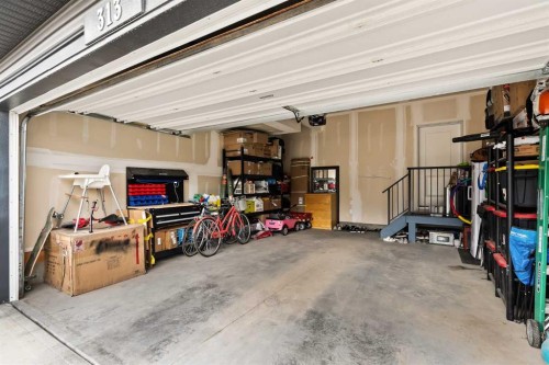 313 Evansglen Drive Nw, Calgary, AB - Indoor Photo Showing Garage