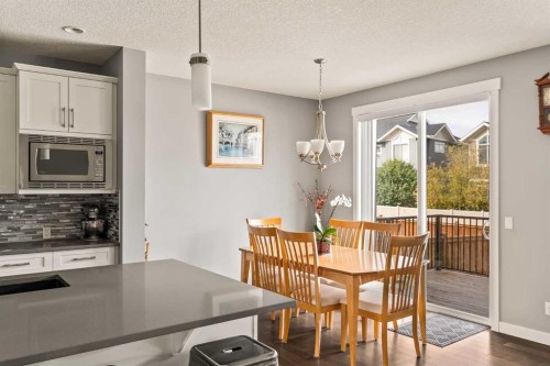 313 Evansglen Drive Nw, Calgary, AB - Indoor Photo Showing Dining Room