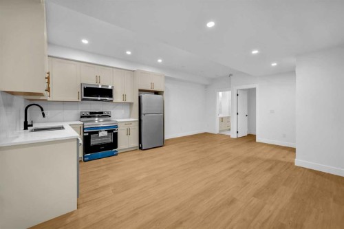 2435 52 Avenue Sw, Calgary, AB - Indoor Photo Showing Kitchen With Stainless Steel Kitchen