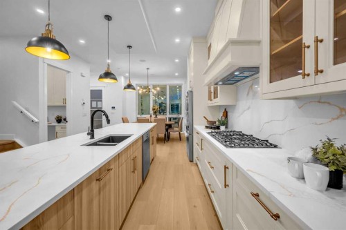 2435 52 Avenue Sw, Calgary, AB - Indoor Photo Showing Kitchen With Double Sink With Upgraded Kitchen