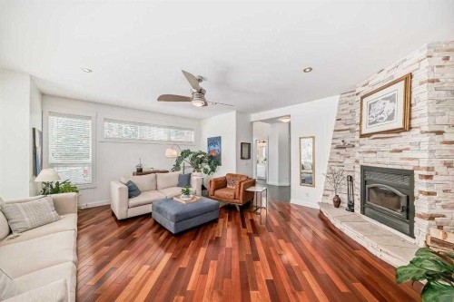 3002 18 Street Sw, Calgary, AB - Indoor Photo Showing Living Room With Fireplace