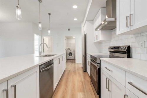 4104-20295 Seton Way Se, Calgary, AB - Indoor Photo Showing Kitchen With Double Sink With Upgraded Kitchen