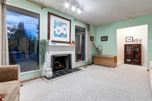 220 Oakridge Place Sw, Calgary, AB - Indoor With Fireplace