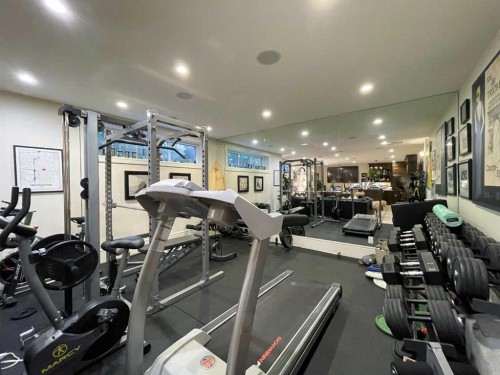 814 Radford Road Ne, Calgary, AB - Indoor Photo Showing Gym Room