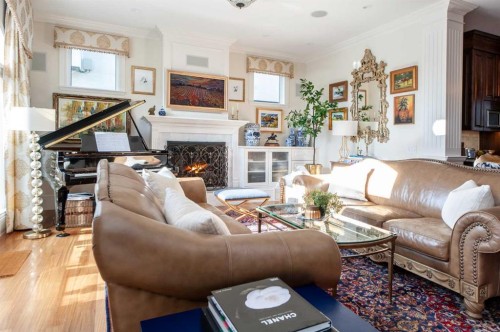 814 Radford Road Ne, Calgary, AB - Indoor Photo Showing Living Room With Fireplace